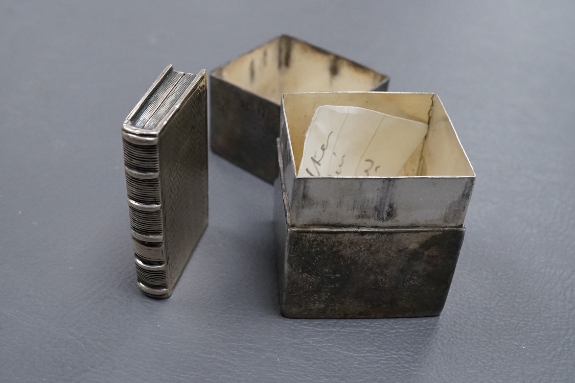 A William IV silver 'book' vinaigrette by Taylor & Perry, Birmingham, 1835, 40mm, together with a white metal box and cover.